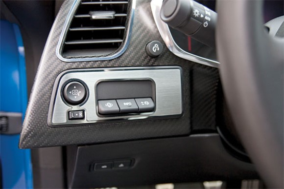MIRROR CNTRL/HUD INFO TRIM PLT. CP